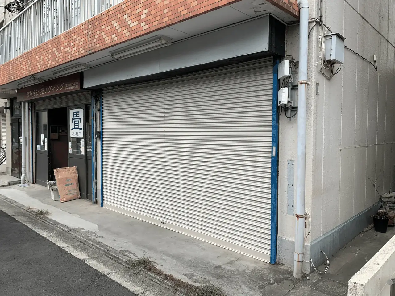 シャッター降下不良による開閉機・スラット交換施工後